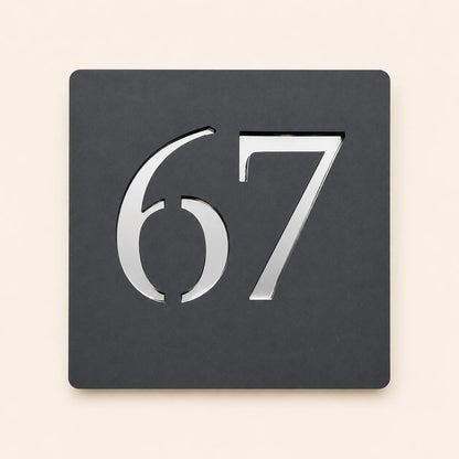 Contemporary anthracite grey acrylic house number sign with raised silver mirror number 67, suitable for modern homes and new builds.