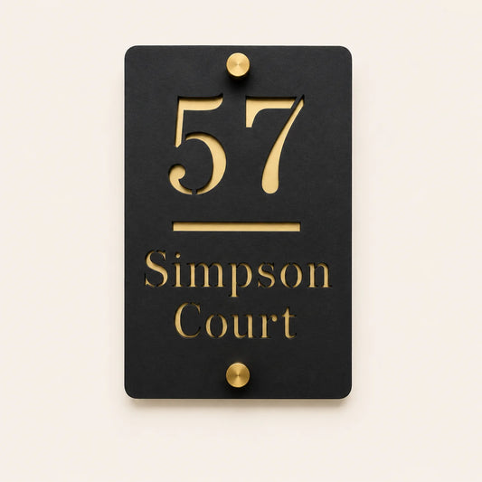 Personalised black vertical acrylic house sign with mirror gold house number and street name