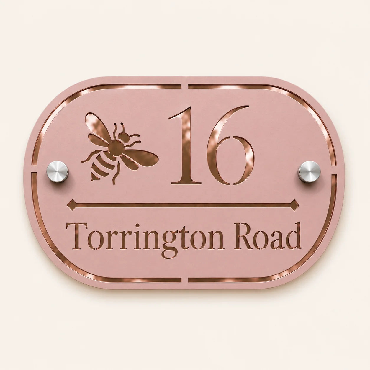 Personalised dusky pink oval acrylic house sign with mirror rose gold bee design, house number and street name