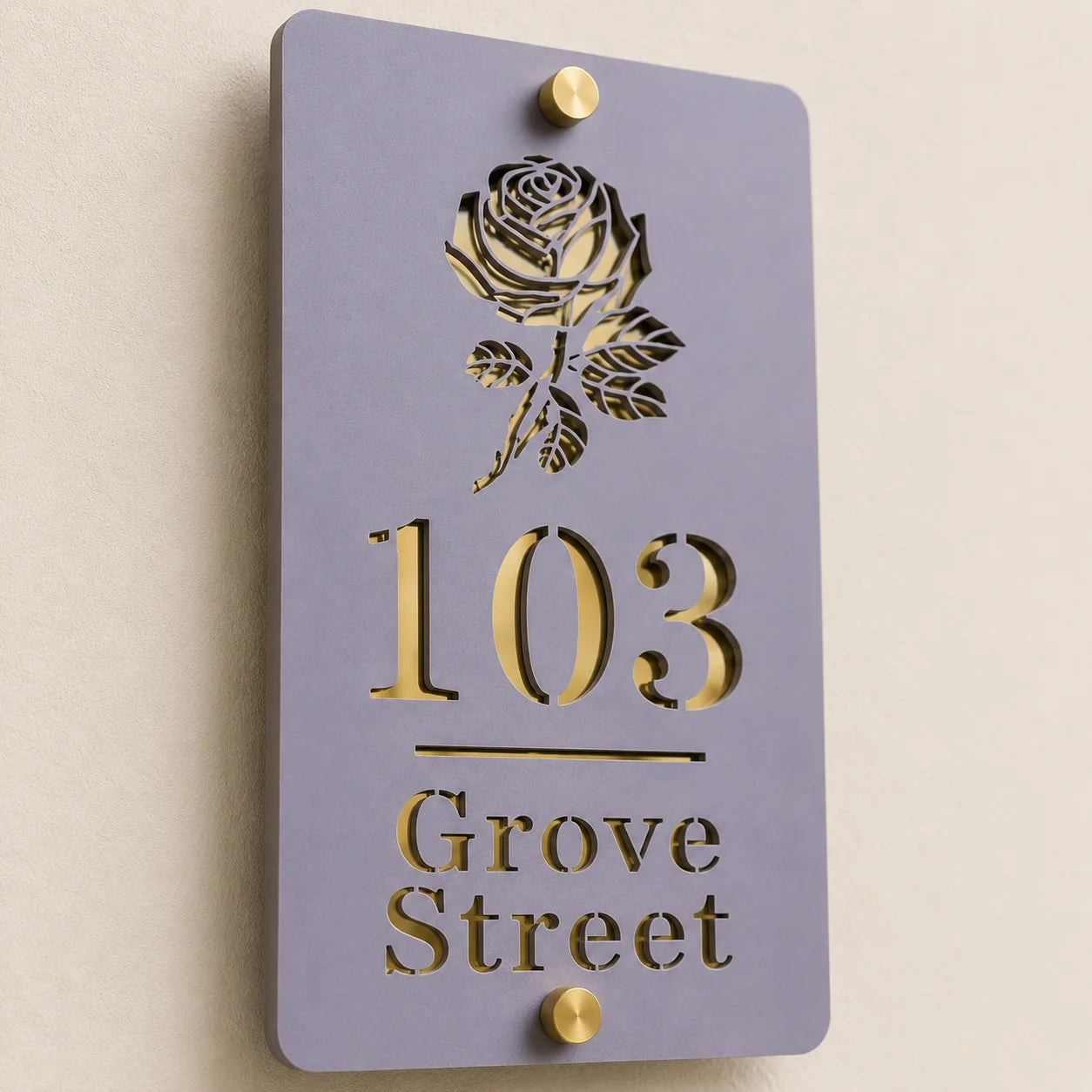 Close-up angled view of personalised lavender vertical acrylic house sign with mirror gold rose design and lettering