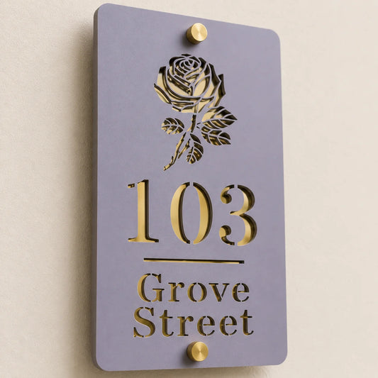 Close-up angled view of personalised lavender vertical acrylic house sign with mirror gold rose design and lettering