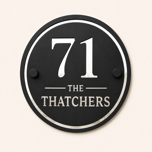 Personalised black and mirror silver round acrylic house sign with house number and family name