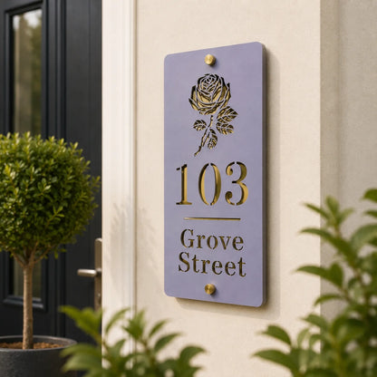 Personalised lavender vertical acrylic house sign with mirror gold rose design mounted beside a modern front door