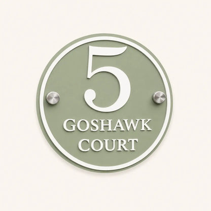 Personalised sage green round acrylic house sign with raised white number 5 and Goshawk Court lettering