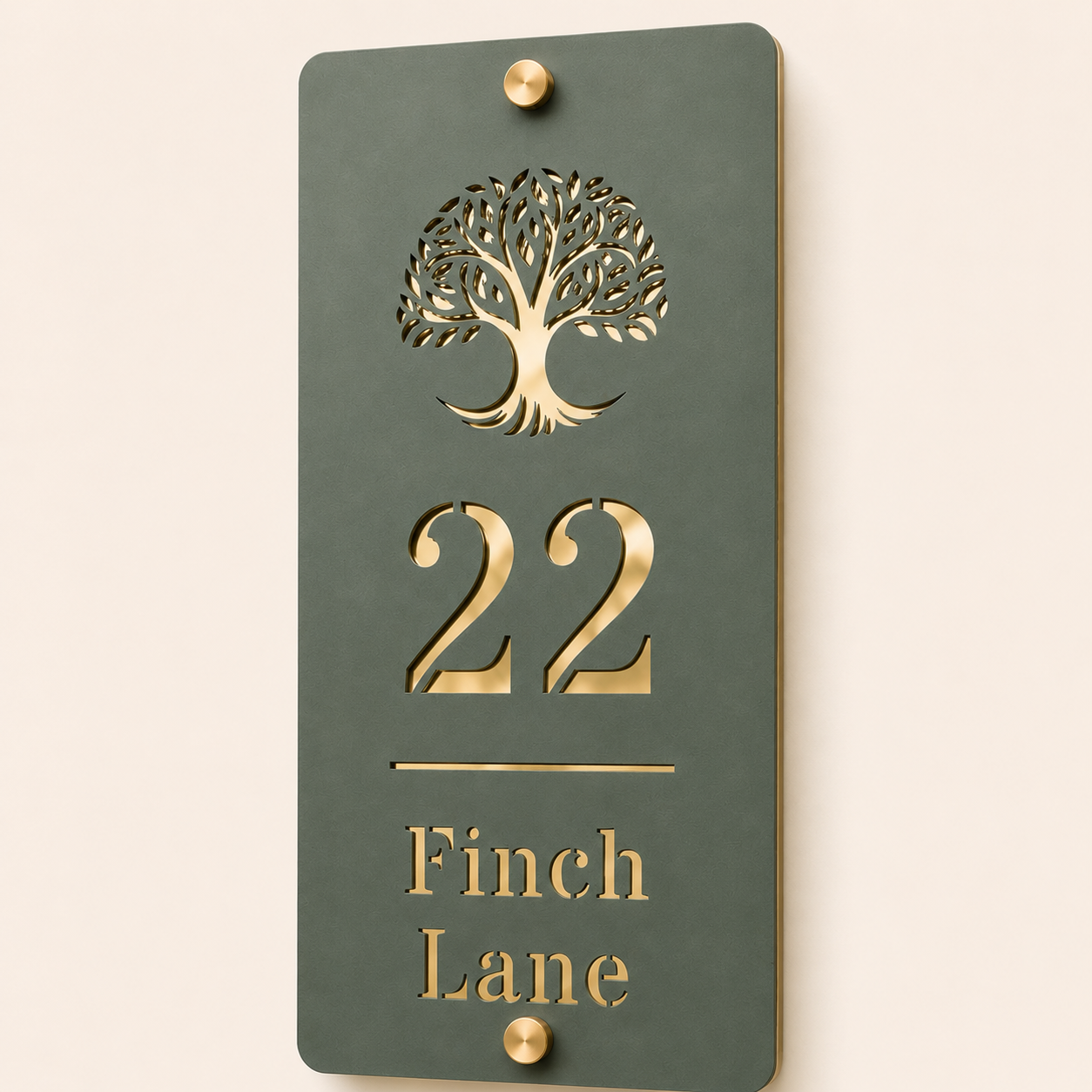 Close-up of a personalised pine green and mirror gold acrylic house sign showing the tree design and number 22