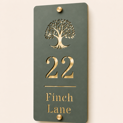 Close-up of a personalised pine green and mirror gold acrylic house sign showing the tree design and number 22