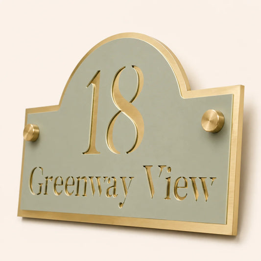 Close-up of personalised sage green and mirror gold arch acrylic house sign showing number and address details