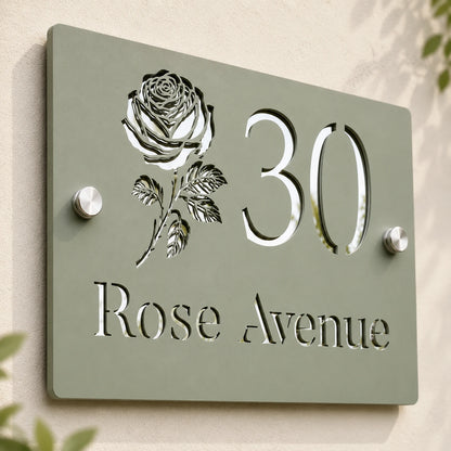 Close-up of personalised sage green acrylic house sign showing mirror silver rose, number and address details