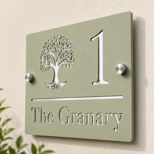 Close-up of personalised sage green and mirror silver acrylic rectangle house sign showing tree design, number and address details