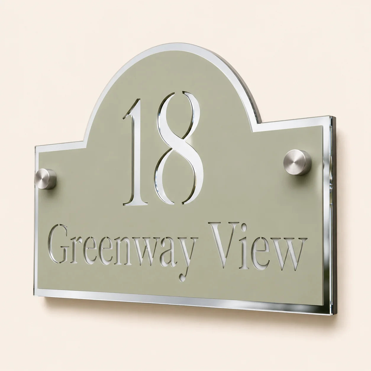 Close-up of personalised sage green acrylic house sign with mirror silver detail