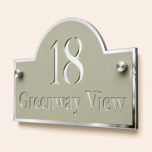 Close-up of personalised sage green acrylic house sign with mirror silver detail